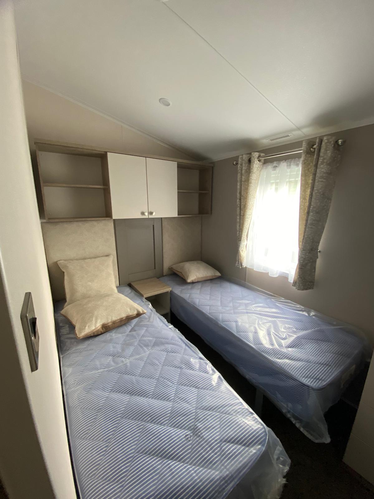 Twin Bedroom with Overhead Storage